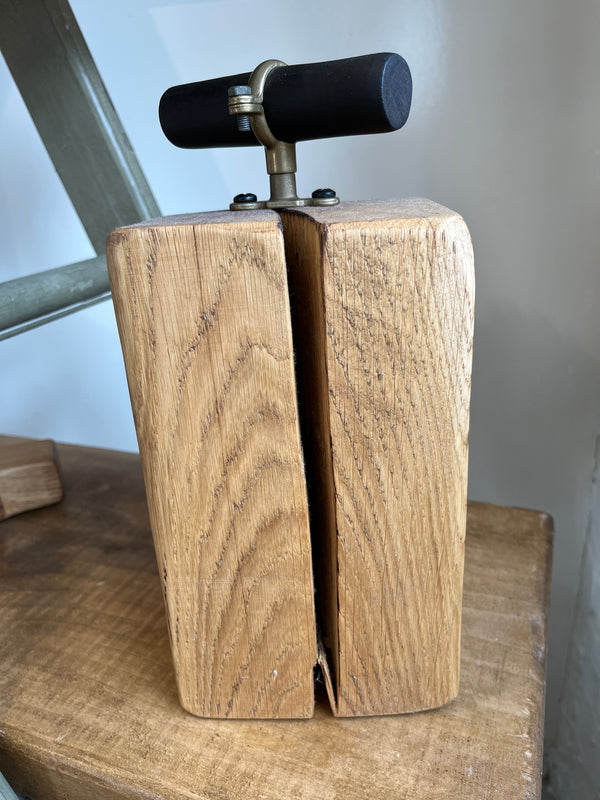 Salvaged timber door stop with handle (natural) by Lost and Found Projects