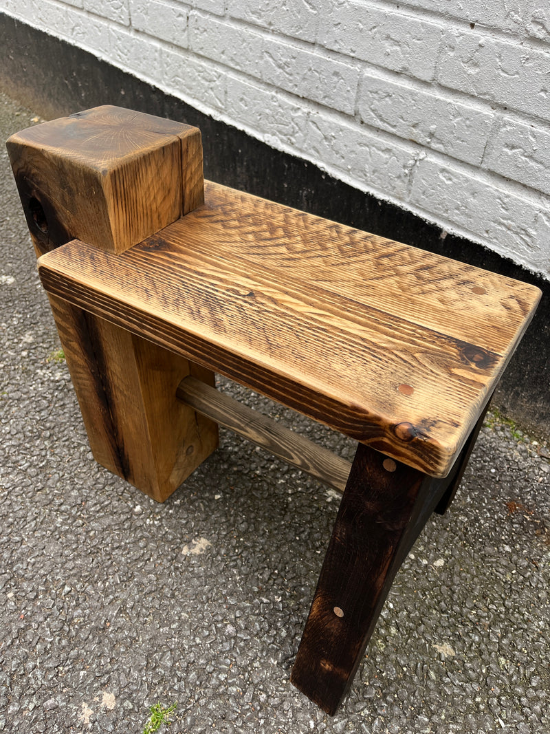 Sleeper stool made from salvage materials by Lost and Found Projects