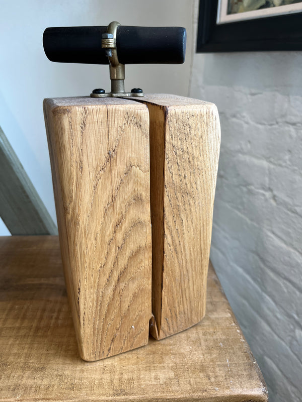 Salvaged timber door stop with handle (natural) by Lost and Found Projects