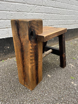 Sleeper stool made from salvage materials by Lost and Found Projects