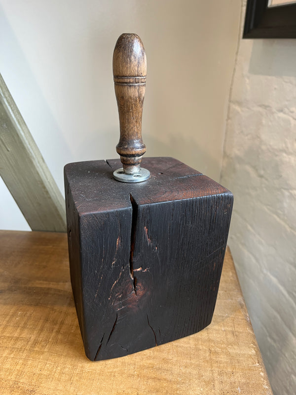 Salvaged timber door stop with handle (dark) by Lost and Found Projects